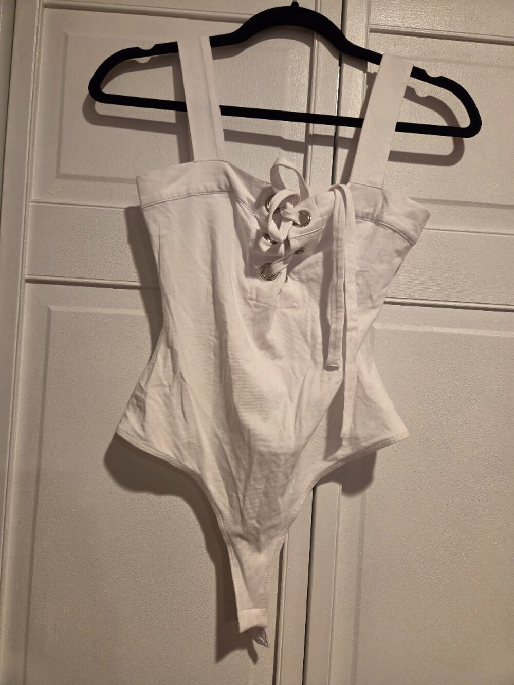 GUESS lace up white body suit size XS